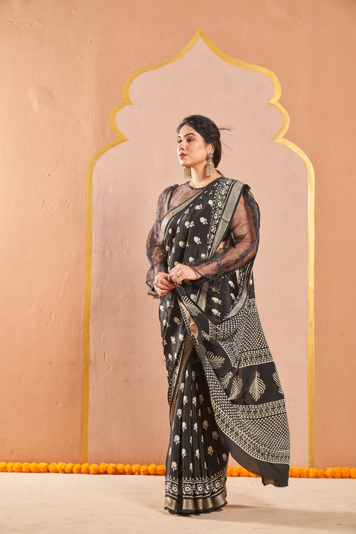 Anvika Black Saree with White Motifs & Designer Border