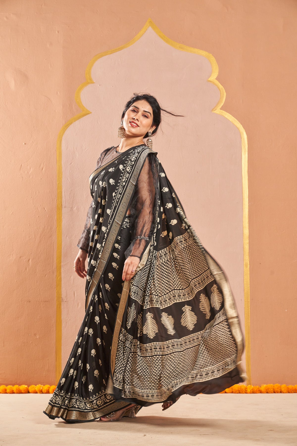 Anvika Black Saree with White Motifs & Designer Border